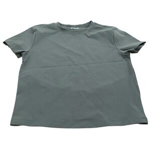 Flx travel crop top smoothing wicking